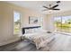 Spacious bedroom with water views and sliding glass doors to deck at 72 Windsor Dr, Englewood, FL 34223