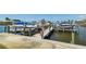 Community boat docks with multiple slips available for residents at 72 Windsor Dr, Englewood, FL 34223