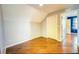 Well-lit bedroom with wood flooring and closet at 814 15Th Ne St, Ruskin, FL 33570