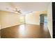 Open living area with wood flooring and neutral colors at 814 15Th Ne St, Ruskin, FL 33570