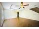 Large living room with hardwood floors and ceiling fan at 814 15Th Ne St, Ruskin, FL 33570