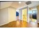 Upstairs hallway with bathroom and bedroom access at 814 15Th Ne St, Ruskin, FL 33570