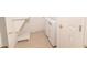 Laundry room with washer, dryer, and extra storage at 12908 Cattail Shore Ln, Riverview, FL 33579