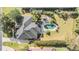 Aerial view showing house, pool, and backyard at 6437 Alcester Dr, New Port Richey, FL 34655