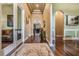 Elegant hallway with hardwood floors and tasteful decor at 6437 Alcester Dr, New Port Richey, FL 34655