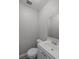 Simple bathroom with vanity and toilet at 7939 Riverdale Dr, New Port Richey, FL 34653