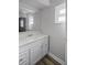 Clean bathroom with white vanity and updated fixtures at 7939 Riverdale Dr, New Port Richey, FL 34653