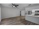 Bright dining area with vinyl flooring and ceiling fan at 7939 Riverdale Dr, New Port Richey, FL 34653