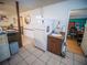 Small kitchen area with refrigerator and sink at 38906 North Ave, Zephyrhills, FL 33542