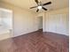 Spacious bedroom with tile flooring and ensuite bathroom access at 3944 Nekoosa St, North Port, FL 34287