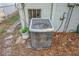 Backyard view of an air conditioning unit at 4137 Glissade Dr, New Port Richey, FL 34652