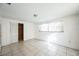 Simple bedroom with tiled floors and wood closet at 4137 Glissade Dr, New Port Richey, FL 34652