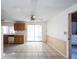 Kitchen with wood cabinets and tiled floor at 4137 Glissade Dr, New Port Richey, FL 34652