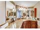 Double vanity bathroom with granite countertop at 2333 Feather Sound Dr # A101, Clearwater, FL 33762