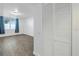 Bedroom with gray laminate flooring and large closet at 2333 Feather Sound Dr # A101, Clearwater, FL 33762