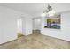 Bright dining area with tile flooring and a view into the kitchen at 2333 Feather Sound Dr # A101, Clearwater, FL 33762