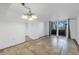 Bright dining room with tile floors and access to a balcony at 2333 Feather Sound Dr # A101, Clearwater, FL 33762