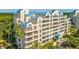 Multi-story building with blue roofs and waterfront views at 2333 Feather Sound Dr # A101, Clearwater, FL 33762