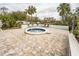 Community hot tub with surrounding patio at 2333 Feather Sound Dr # A101, Clearwater, FL 33762