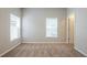 Spacious bedroom with neutral walls and carpet at 7707 N Riverdale Ave, Tampa, FL 33604