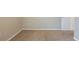 Empty bedroom with neutral walls and carpet flooring at 7707 N Riverdale Ave, Tampa, FL 33604
