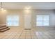 Bright entryway with tile floors and neutral walls at 7707 N Riverdale Ave, Tampa, FL 33604