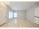 Spacious living room featuring tile floors at 7707 N Riverdale Ave, Tampa, FL 33604