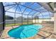 Refreshing screened pool with ample deck space at 11223 Spring Gate Trl, Bradenton, FL 34211