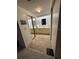 Double vanity bathroom with mirrored closet at 3301 Alt 19 Lot 819, Palm Harbor, FL 34683