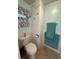 Clean bathroom with updated fixtures and storage at 3301 Alt 19 Lot 819, Palm Harbor, FL 34683