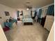 Bedroom with ceiling fan, carpet, and a dresser at 3301 Alt 19 Lot 819, Palm Harbor, FL 34683