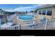 Refreshing community pool area with patio furniture at 3301 Alt 19 Lot 819, Palm Harbor, FL 34683