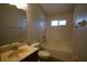 Bathroom with tub, single vanity and mirror at 4311 Rustic Pine Pl, Wesley Chapel, FL 33544