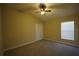 Spacious bedroom with ceiling fan and window blinds at 4311 Rustic Pine Pl, Wesley Chapel, FL 33544