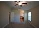 Primary bedroom with en-suite bathroom access at 4311 Rustic Pine Pl, Wesley Chapel, FL 33544