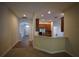 View of kitchen and hallway with tile flooring at 4311 Rustic Pine Pl, Wesley Chapel, FL 33544