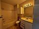 Bathroom with tub, toilet, and vanity with drawers at 5707 Legacy Crescent Pl # 303, Riverview, FL 33578