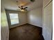 Bright bedroom featuring carpet and a ceiling fan at 5707 Legacy Crescent Pl # 303, Riverview, FL 33578