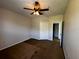 Spacious bedroom with carpet flooring and ceiling fan at 5707 Legacy Crescent Pl # 303, Riverview, FL 33578