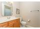 Small bathroom with single sink vanity, toilet and shower/tub combo at 7313 Emma Rd, Bradenton, FL 34209