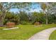 Landscaped park with benches and walking paths at 7313 Emma Rd, Bradenton, FL 34209