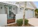 Front entrance with double doors and a decorative gate at 7313 Emma Rd, Bradenton, FL 34209