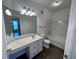 Bathroom features vanity, tub and flooring at 10412 Villa View Cir, Tampa, FL 33647