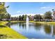 Community lake with fountain and landscaping at 10412 Villa View Cir, Tampa, FL 33647