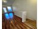 Living room with wood-look flooring and a loft at 10412 Villa View Cir, Tampa, FL 33647