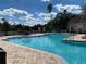 Community swimming pool with lounge chairs at 10412 Villa View Cir, Tampa, FL 33647