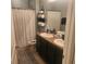 Double vanity bathroom with shower and updated fixtures at 109 Tierra Verde Way, Bradenton, FL 34212