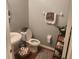 Clean and simple bathroom with white vanity and toilet at 109 Tierra Verde Way, Bradenton, FL 34212