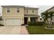 Two-story house with a two-car garage and landscaped lawn at 109 Tierra Verde Way, Bradenton, FL 34212