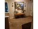 Elegant hallway with decorative console table and artwork at 109 Tierra Verde Way, Bradenton, FL 34212